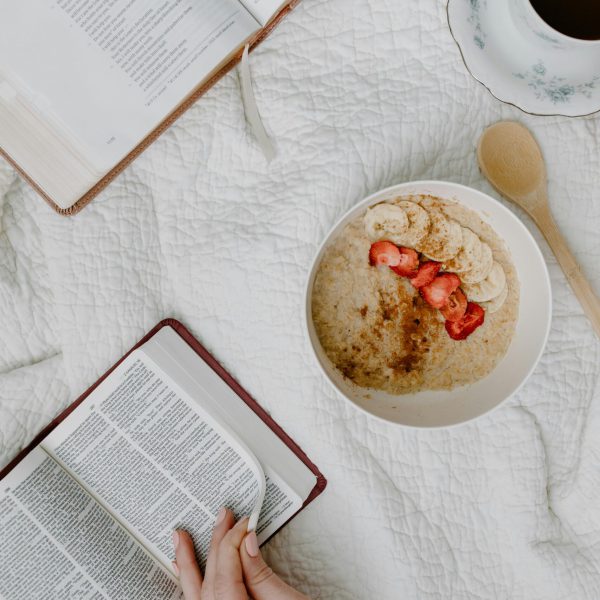 pexels-photo-8383475-8383475 Top view of a morning routine with Bible reading, coffee, and healthy breakfast.